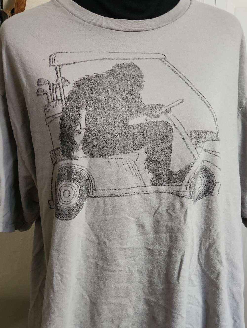 Men's Light Gray Sasquatch Driving a Golf Cart Graphic